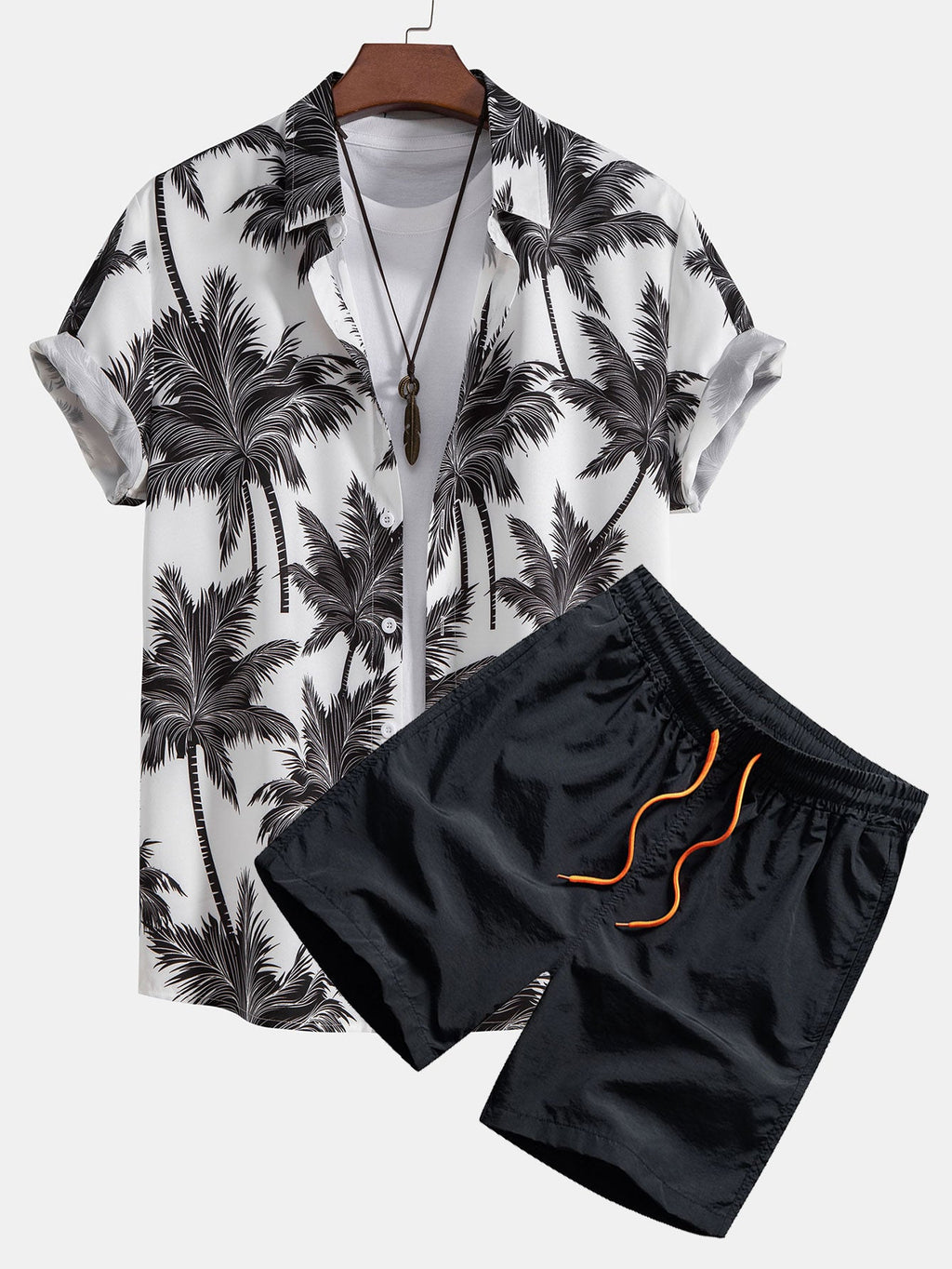 Conjunto de camisa abotonada con estampado de palmeras y pantalón corto de baño