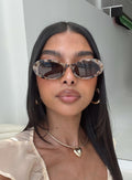 Gafas de sol ovaladas marron