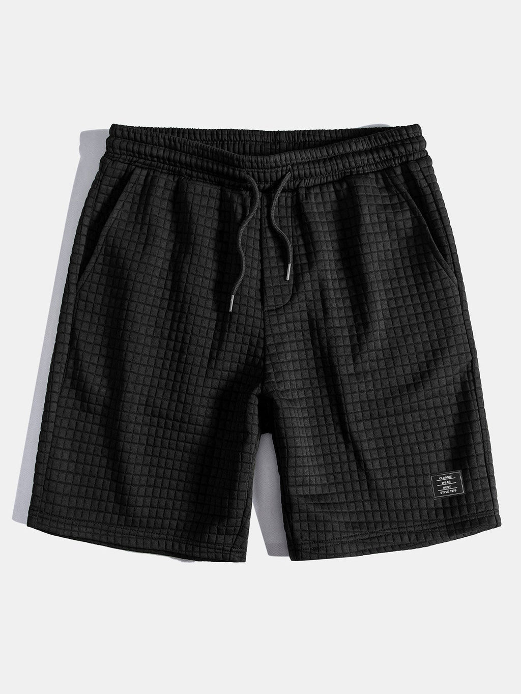 Conjunto de camiseta de manga corta de tejido waffle con dobladillo curvado y pantalones cortos