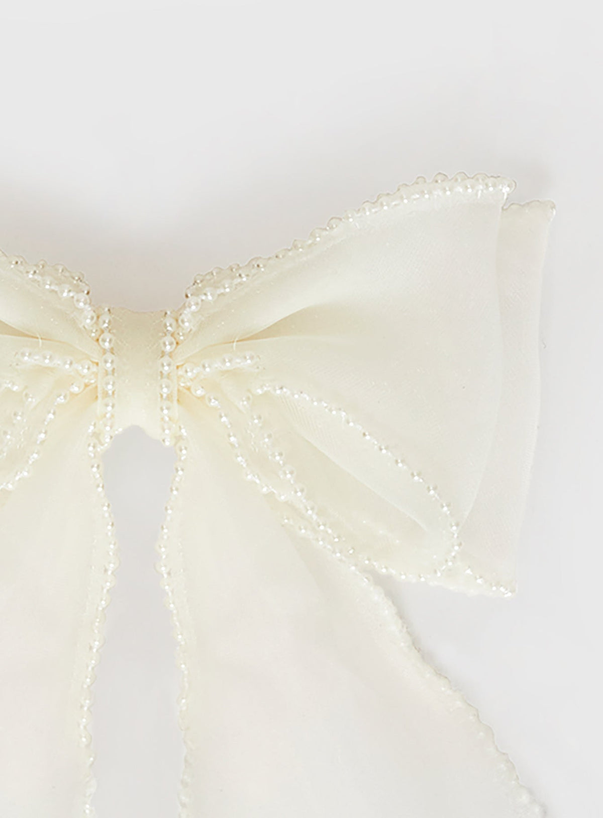 Lazo blanco elegante para el cabello