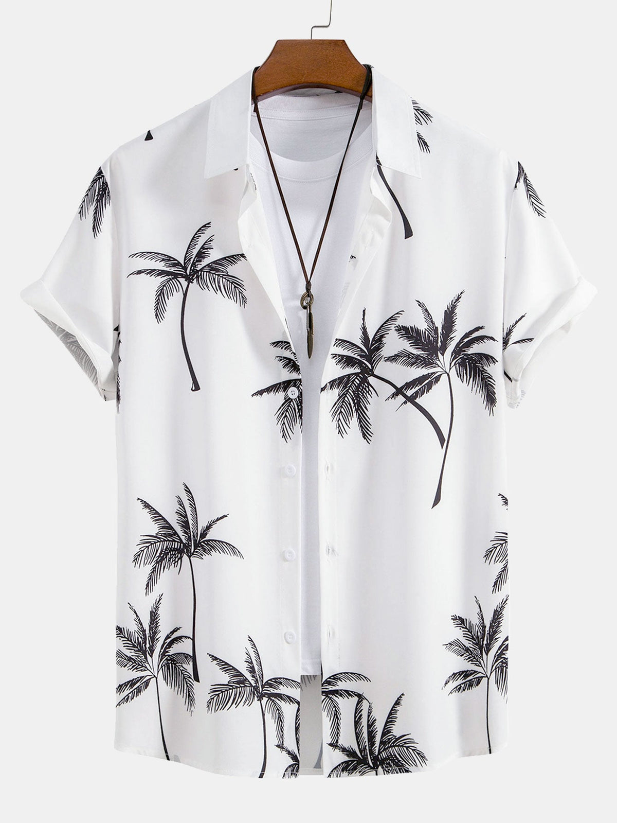 Conjunto de camisa abotonada con estampado de palmeras y shorts de baño a rayas