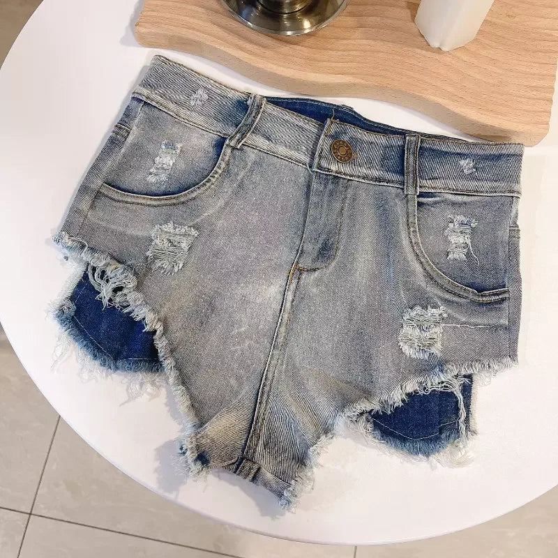 Microshorts vaqueros deshilachado a la moda