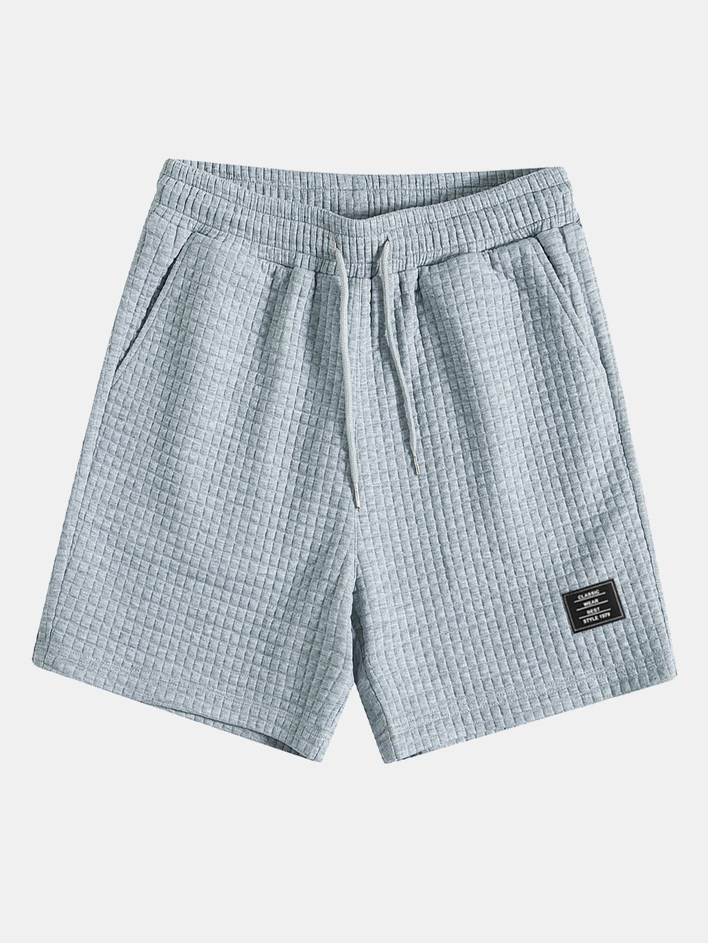 Conjunto de camiseta de manga corta de tejido waffle con dobladillo curvado y pantalones cortos