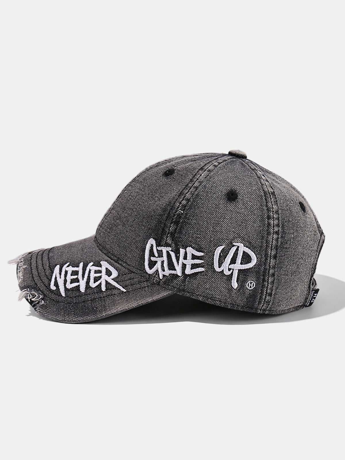 Gorra de mezclilla vintage con visera deshilachada y eslogan bordado «Nunca te rindas»