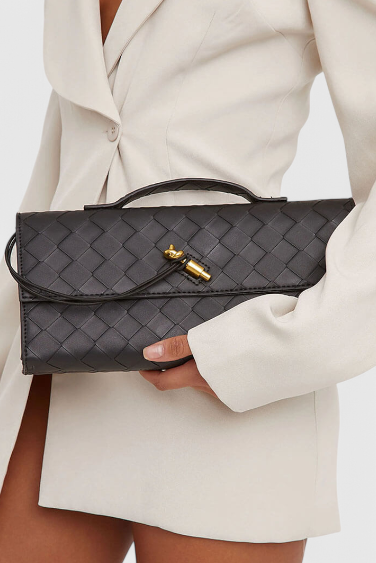 Melanie | Elegante bolso de mano con sofisticado detalle de nudo dorado