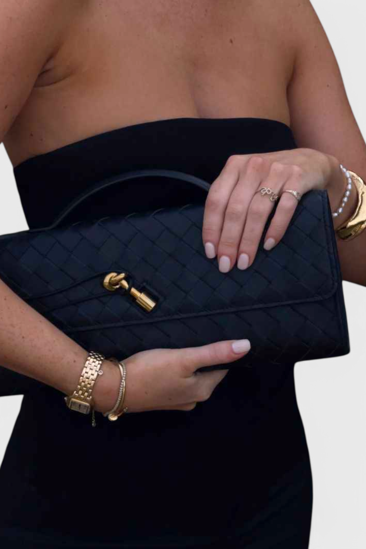 Melanie | Elegante bolso de mano con sofisticado detalle de nudo dorado