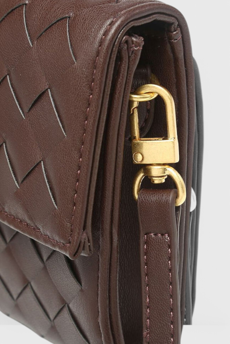 Melanie | Elegante bolso de mano con sofisticado detalle de nudo dorado