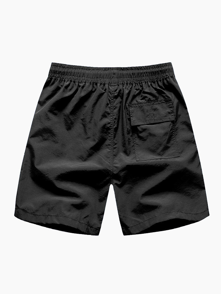 Conjunto de camisa abotonada con estampado de palmeras y pantalón corto de baño