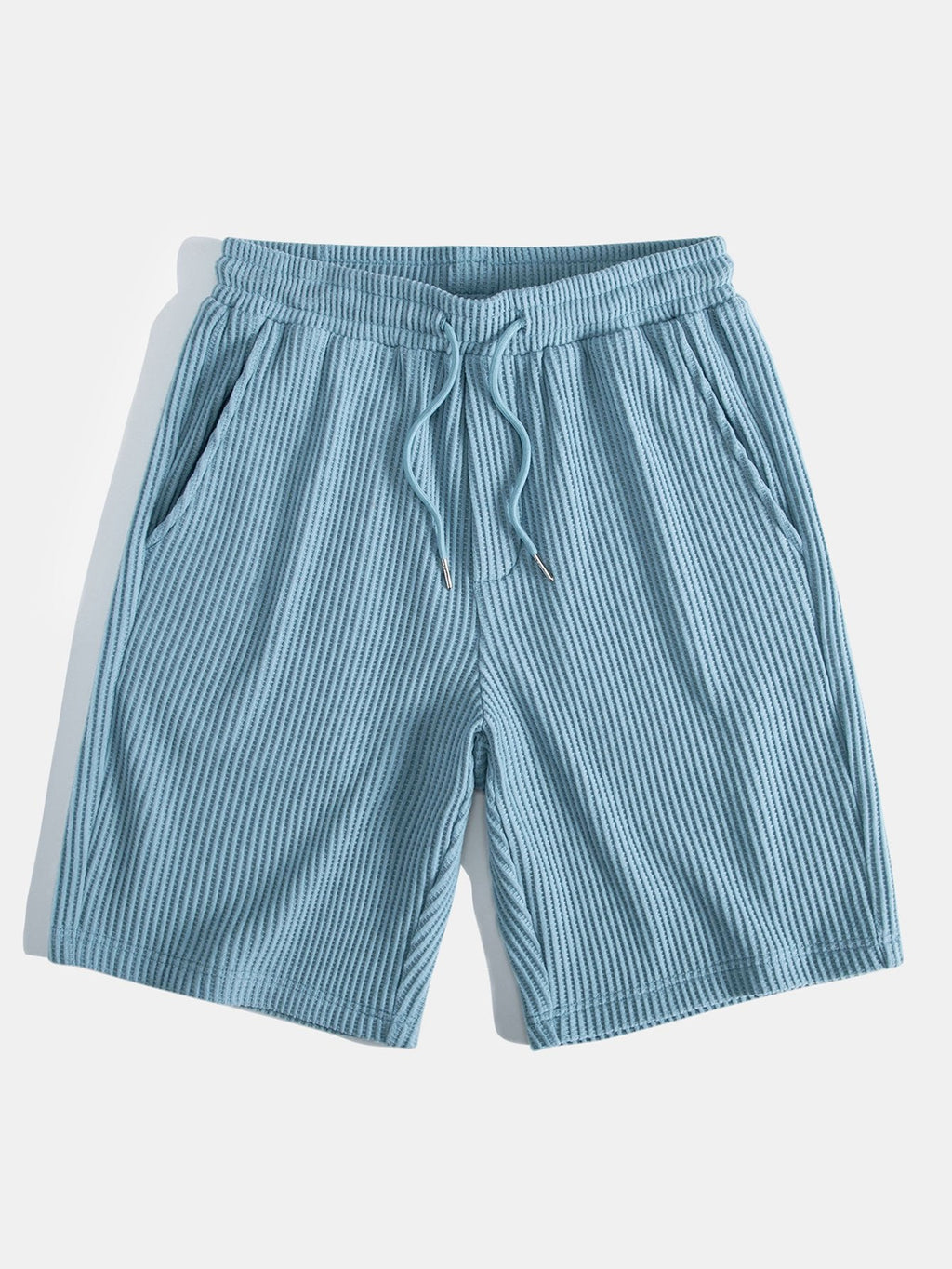 Conjunto de camiseta con capucha de tejido gofrado y bajo curvado, con pantalones cortos a juego y cordón ajustable