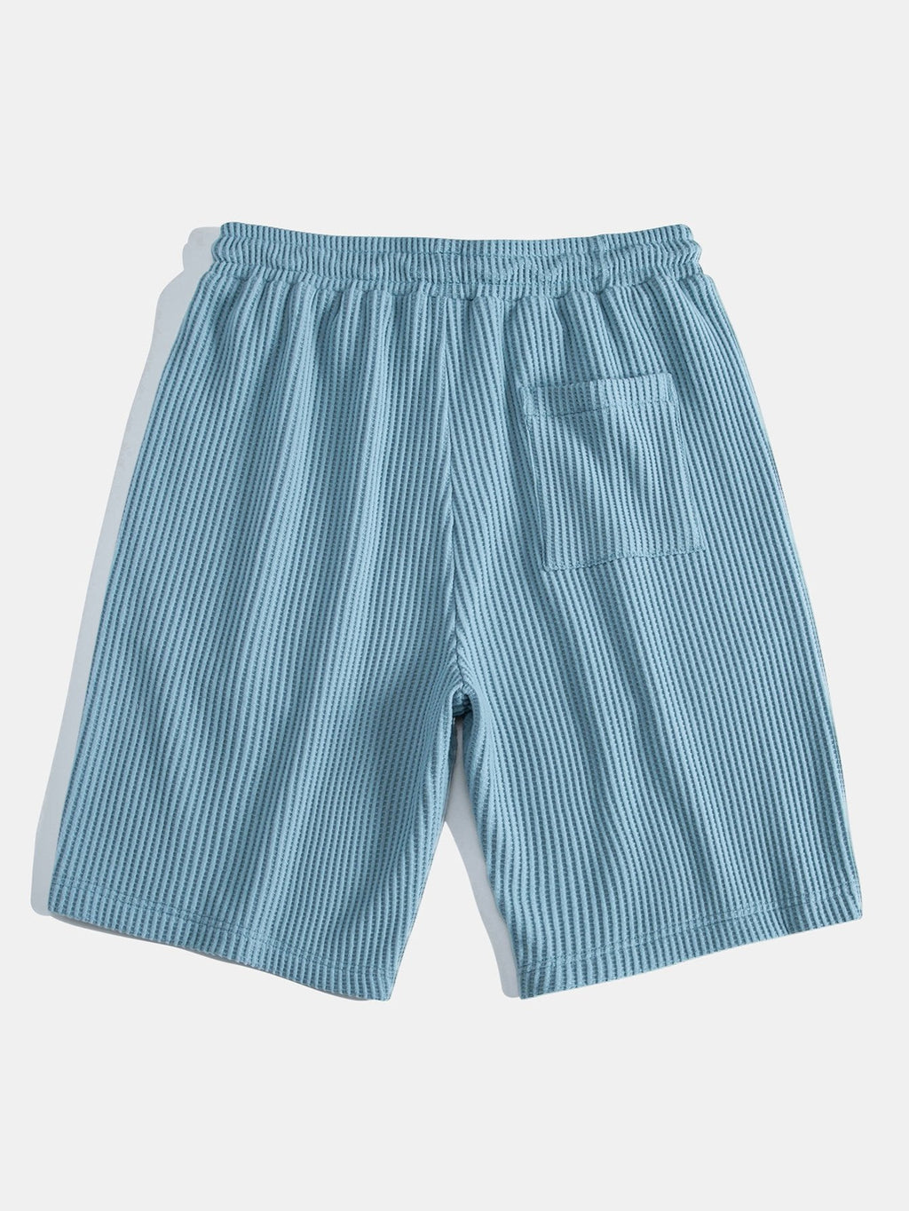 Conjunto de camiseta con capucha de tejido gofrado y bajo curvado, con pantalones cortos a juego y cordón ajustable