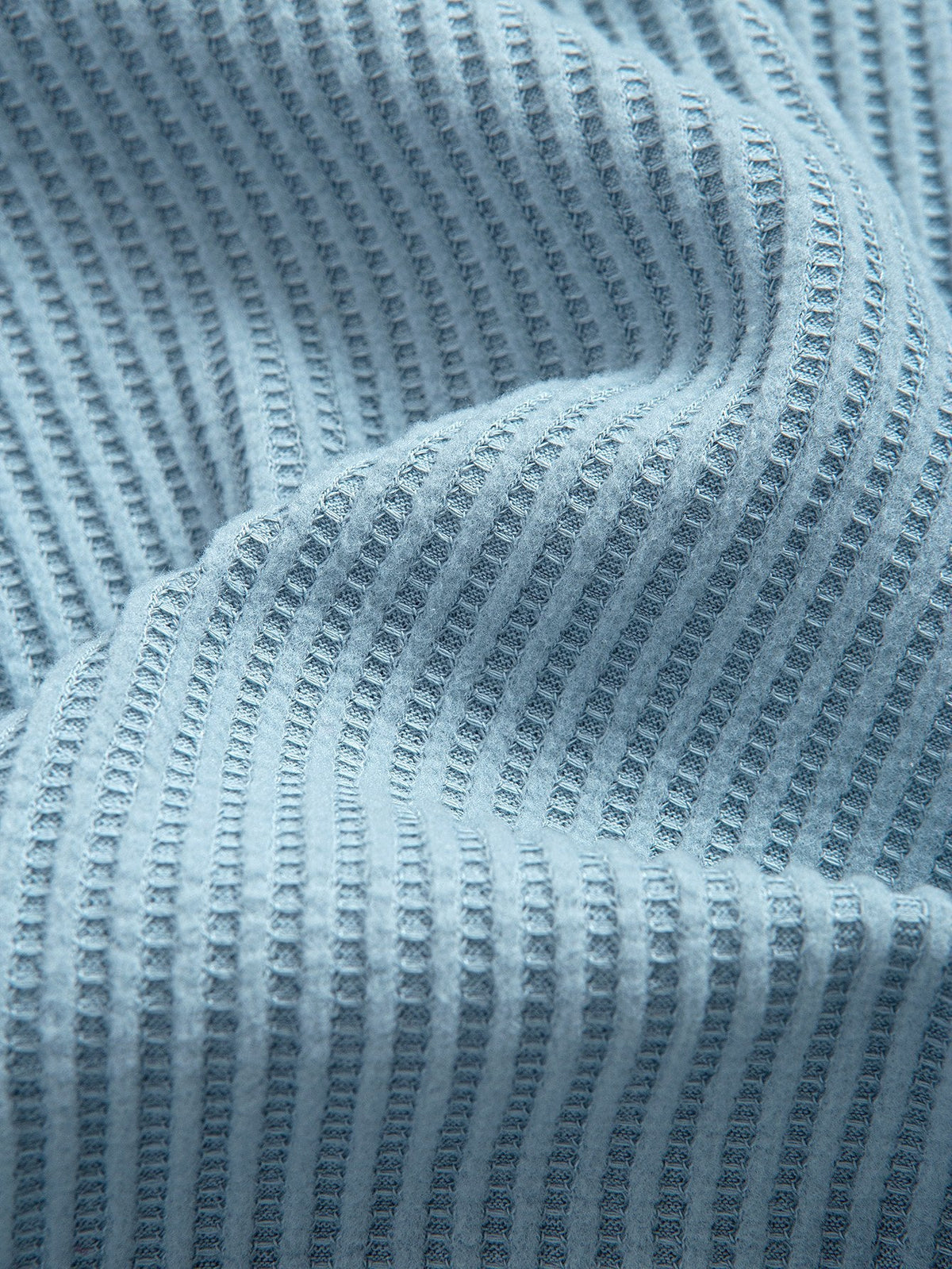 Conjunto de camiseta con capucha de tejido gofrado y bajo curvado, con pantalones cortos a juego y cordón ajustable